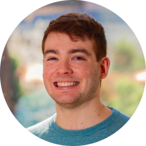 Headshot of Andrew Ennis, Director of External Affairs, smiling.