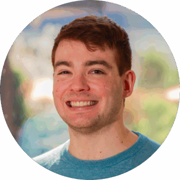Headshot of Andrew Ennis, Director of External Affairs, smiling.