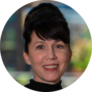 Headshot of Ashley Tuttle, Director of Faculty, smiling.