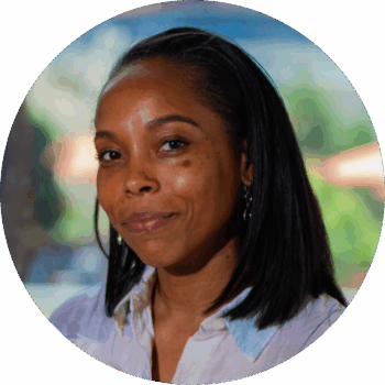 Headshot of Dionne Figgins, Artistic Director of Ballet Tech, smiling.