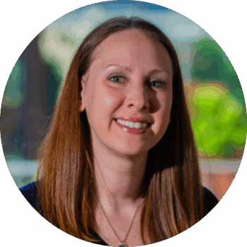 Headshot of Janel Rayome, Administrative Director of Ballet Tech, smiling.