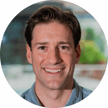 Headshot of Joe Gregori, Administrative Director of Ballet Tech, smiling.