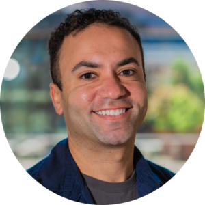 Headshot of Joshua Palmer, Director of People and Culture, smiling.