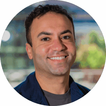Headshot of Joshua Palmer, Director of People and Culture, smiling.