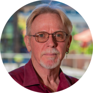 Headshot of Russell Murphy, Director of Finance, looking intently.