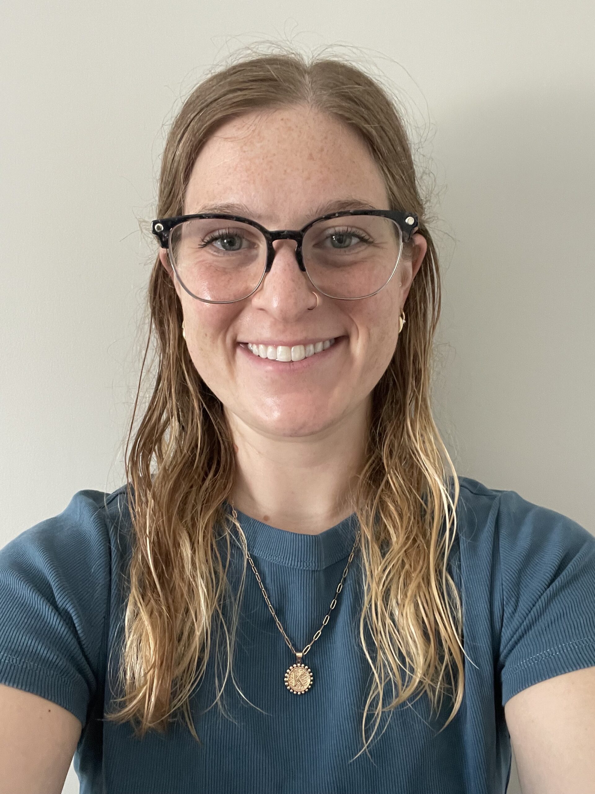Headshot of Katelynn Kozak, Fourth Grade Teacher, smiling.