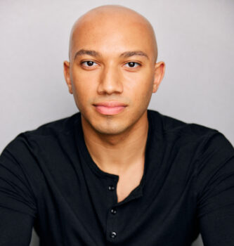 Headshot of John Manzari, Tap Instructor, looking straight at the camera.